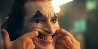 Joaquin Phoenix tries to put on a happy face in Joker