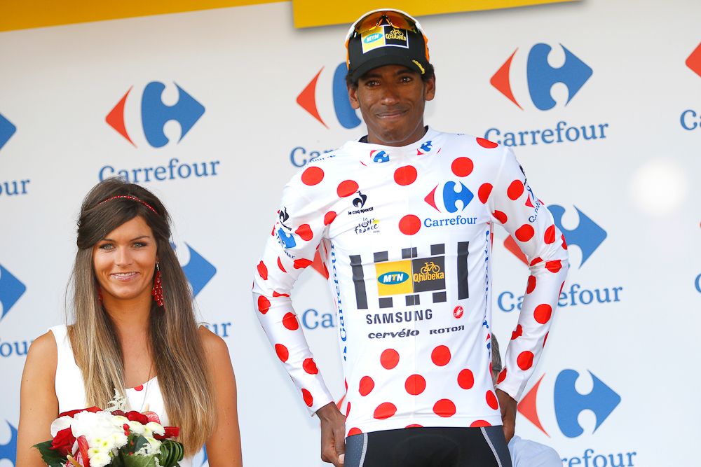 Daniel Teklehaimanot (MTN-Qhubeka) wears the polka dot jersey on the stage 6 podium.