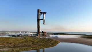 SpaceX's Starship Flight 5 rocket hanging from its launch pad after landing