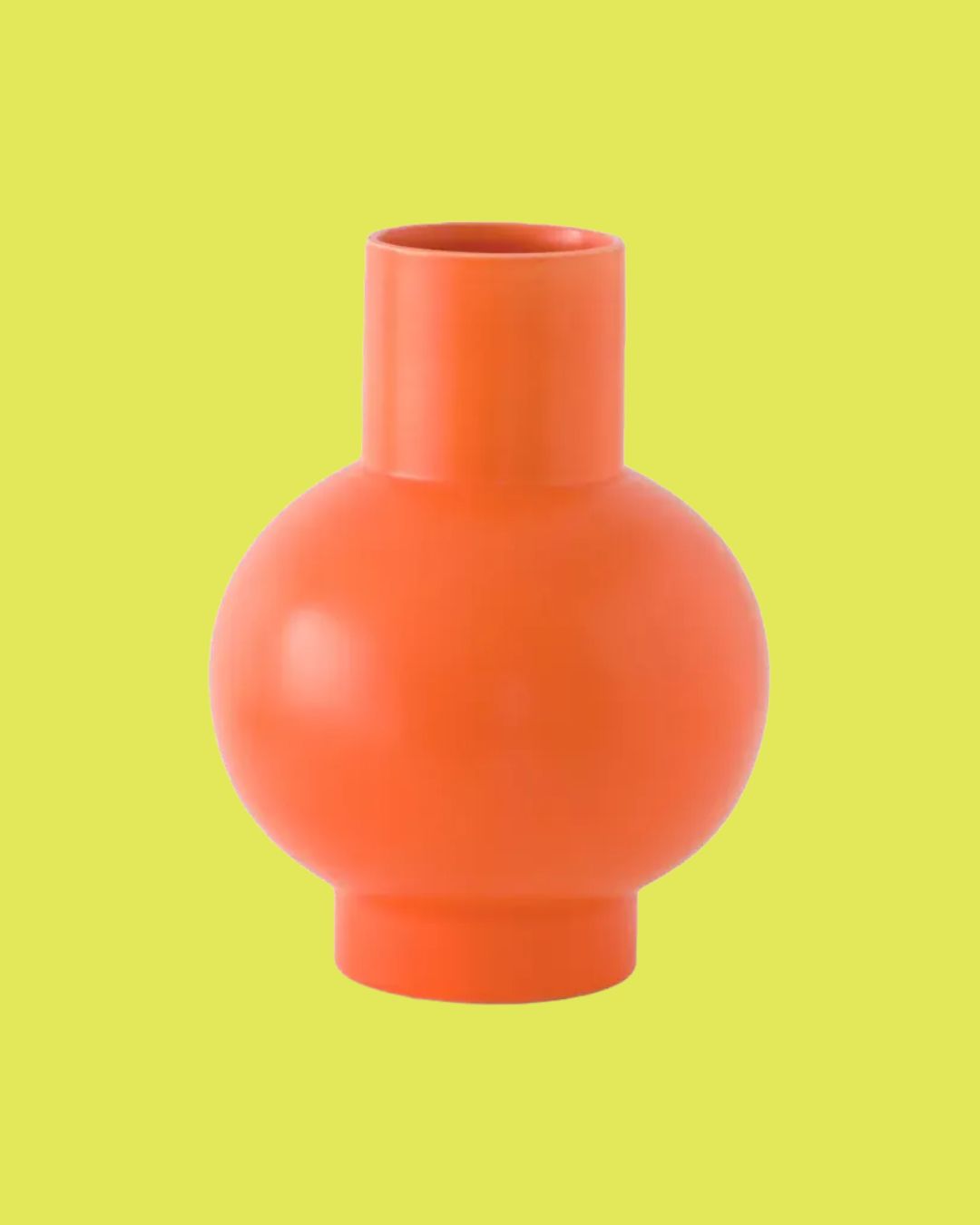 Str&amp;oslash;m Earthenware Vase against orange background.