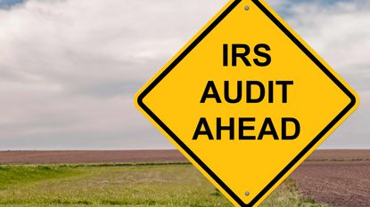 picture of road sign saying "IRS audit ahead"