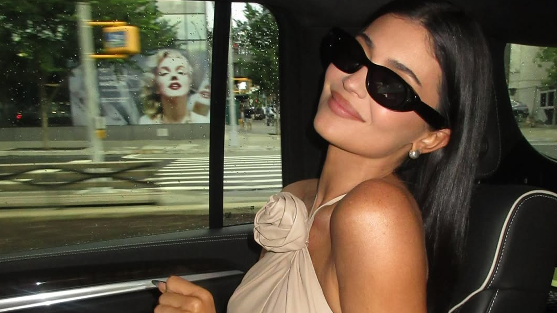 Kylie Jenner Designed Smart Sunglasses to Capture Her Vintage Dress