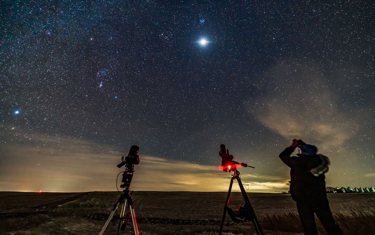 A selfie of the successful eclipse hunter observing the eclipse of the Moon, on the morning of November 19, 2021, having chased into clear skies to get the 97% partial lunar eclipse of Nov. 18/19, 2021 from Alberta. 