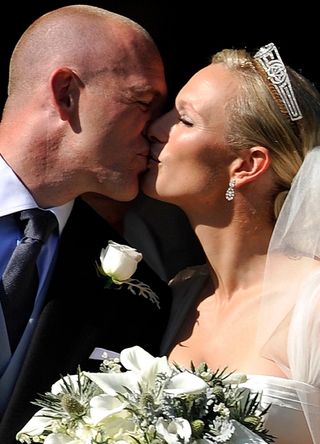 Mike and Zara Tindall kiss on their wedding day