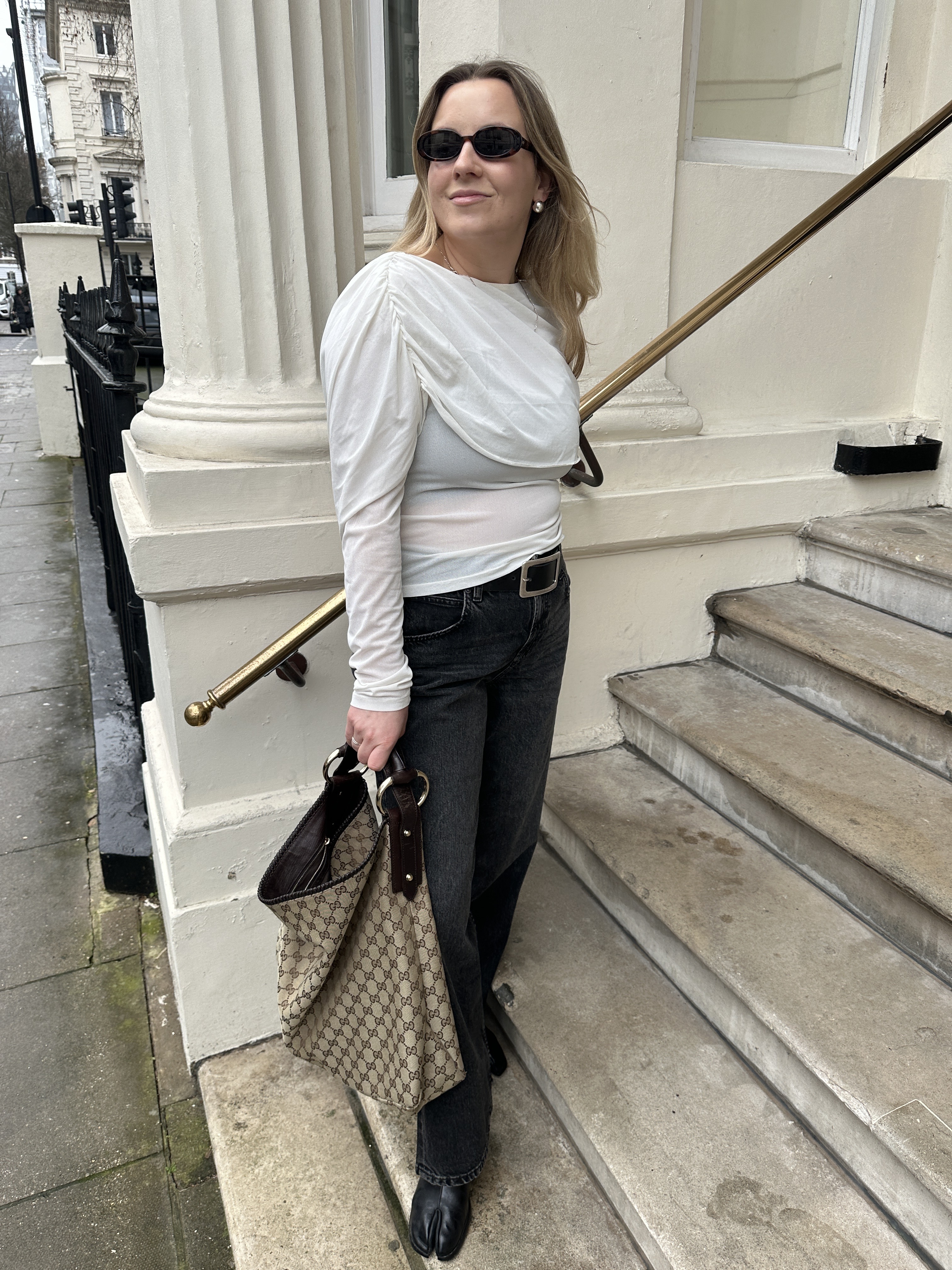 An image of Who What Wear UK Fashion Editor, Remy Farrell, wearing Asos low-rise jeans.