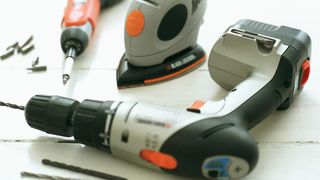 power tools on a wooden work bench