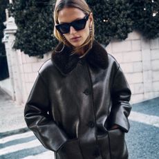 Woman wearing ZARA jacket