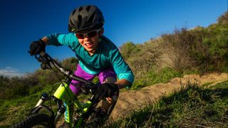 Child riding a mountain bike