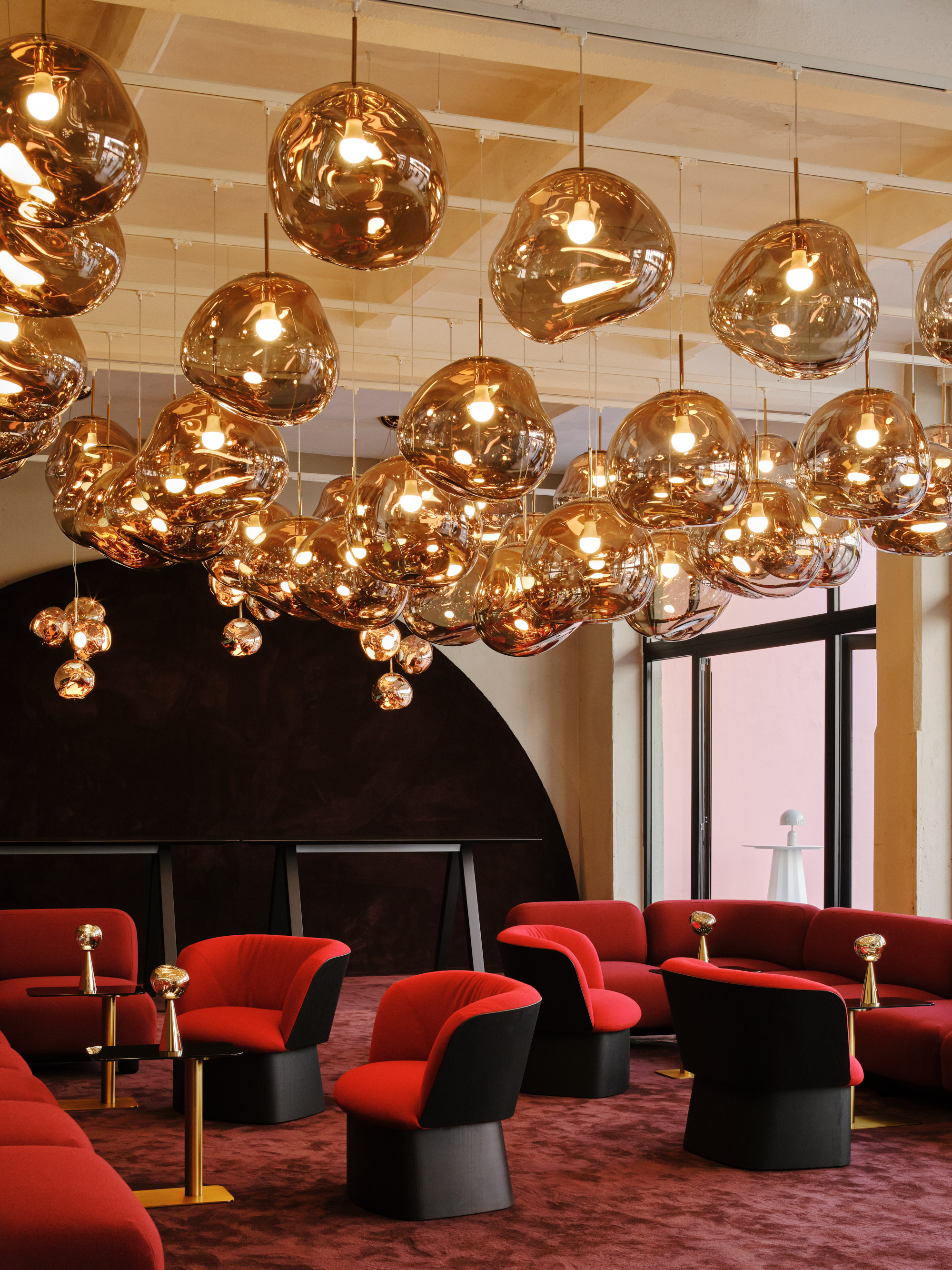 Inside Mua Mua Hotel designed by Tom Dixon for Milan Design Week 2026, featuring Tom Dixon x Vispring bed collaboration