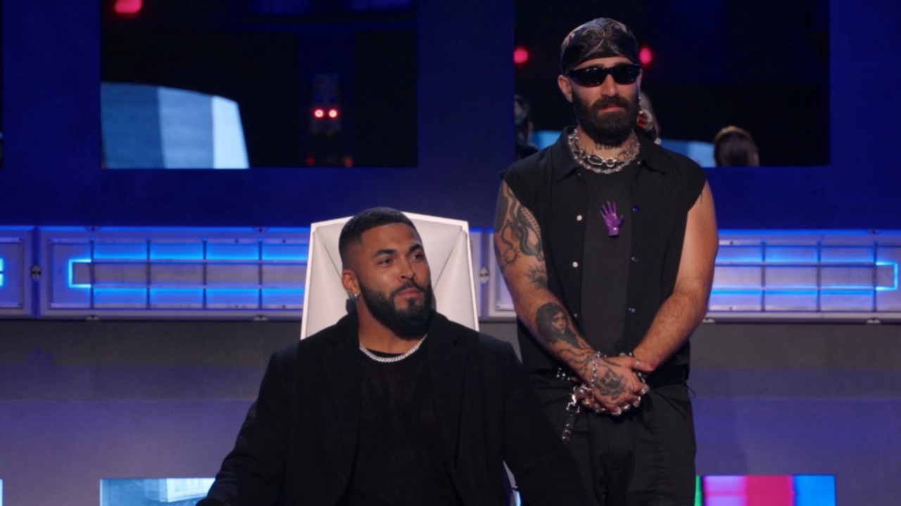 Paul Abrahamian standing behind Johnny Middlebrooks in House of Villains.