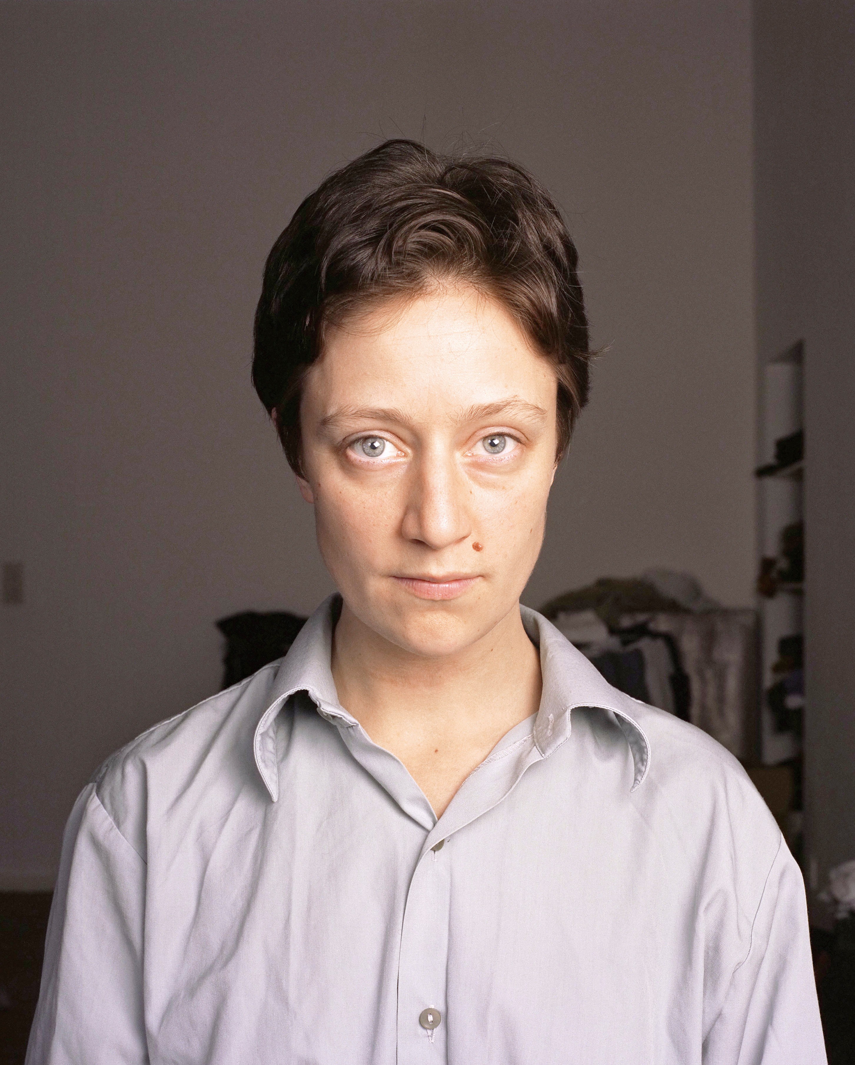 Manipulated photo merging multiple people's faces, by Vibeke Tandberg