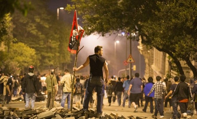 A protestor looks on during clashes with Turkish police near Prime Minister Recep Tayyip Erdogan&amp;#039;s office in Istanbul, on June 4.