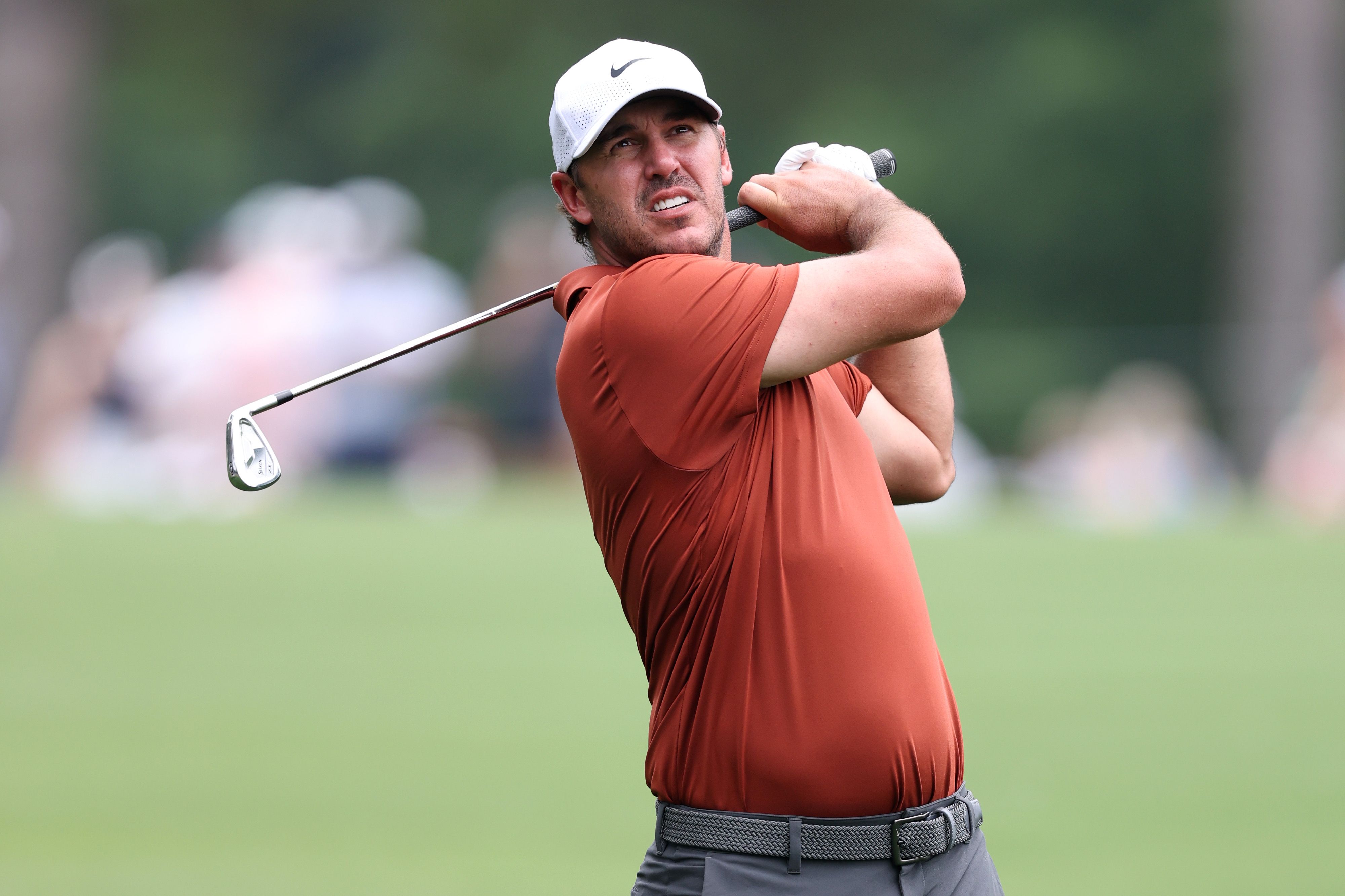 Brooks Koepka hits an iron shot