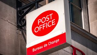 Post Office branch signage on a building