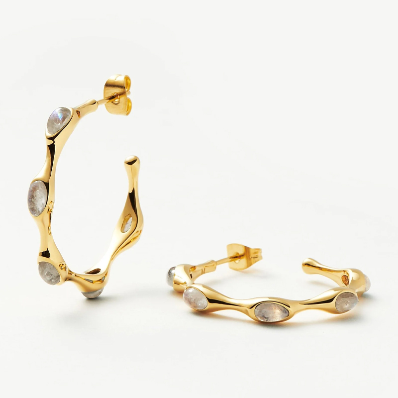 Missoma gold hoop earrings with moonstone studded detail