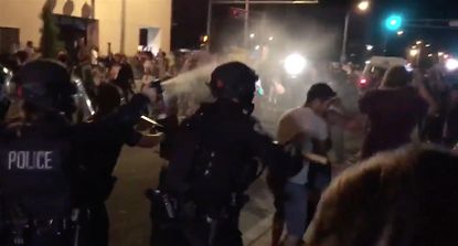 Albuquerque police pepper-spray protesters