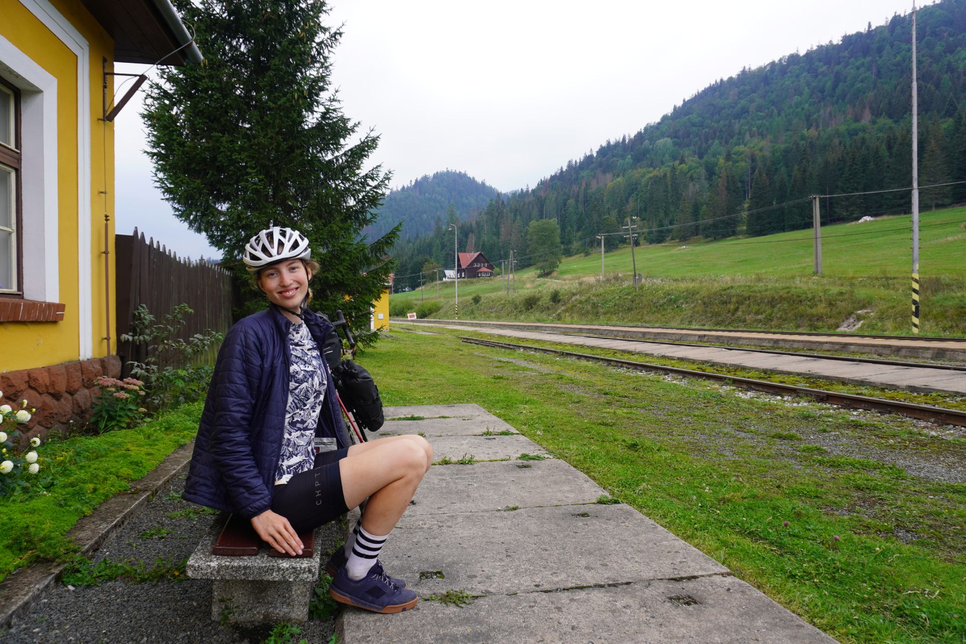 Image shows Anna outside Dobšinská station which doesn't have a platofrm