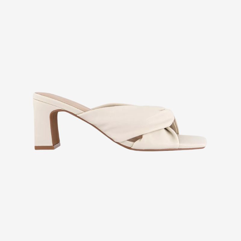 Image of white knotted mules