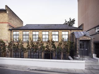 Architecture studio Paper House Project has breathed new life into a former Victorian school hall in London’s West Greenwich Conservation Area.