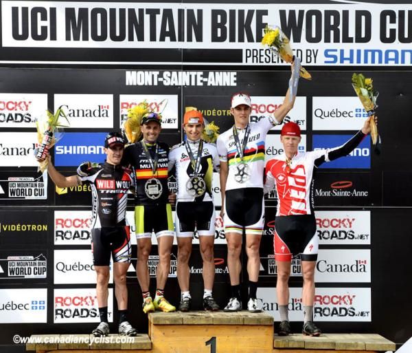 Elite men's podium at Mont-Sainte-Anne: Carlos Coloma (Wildwolf-Trek), Jose Hermida (Multivan Merida), Nino Schurter (Scott Swisspower), Jaroslav Kulhavy (Specialized), Max Plaxton (Specialized)