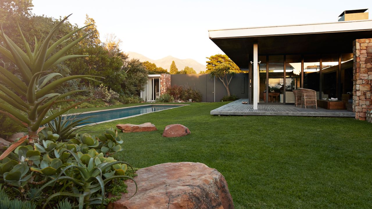 a backyard lawn and pool