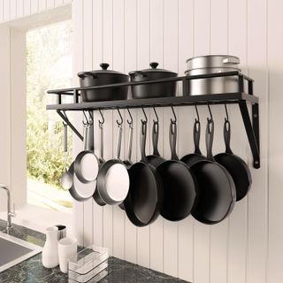 Pots and pans hanging up in kitchen