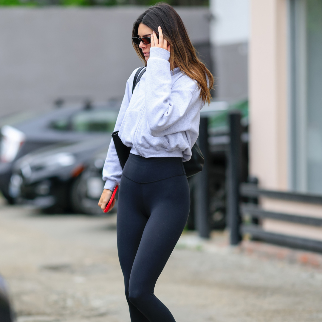 Who made Kendall Jenner's green jacket, black leggings, and white sneakers?  – OutfitID