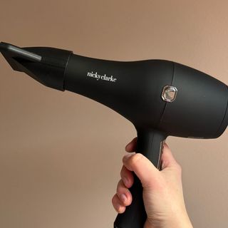 Laura holding Nicky Clarke Infrared Pro Hair Dryer - best hair dryers