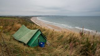 tent pitched near a beach