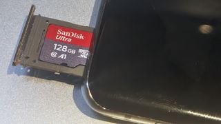 Close up of MicroSD card in old Samsung Galaxy S10