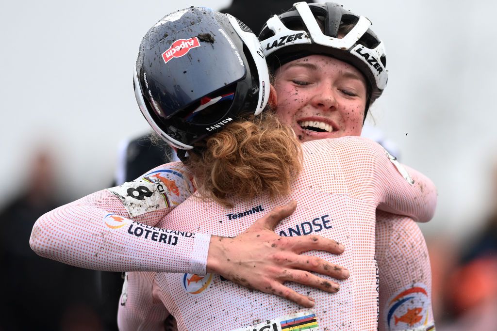 HOOGERHEIDE NETHERLANDS FEBRUARY 04 Race winner Fem van Empel of The Netherlands and Puck Pieterse of The Netherlands on second place celebrate at finish line during the 74th World Championships CycloCross 2023 Womens Elite CXWorldCup Hoogerheide2023 on February 04 2023 in Hoogerheide Netherlands Photo by David StockmanGetty Images