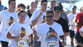 Runners head out on the 15th annual Long Beach Turkey Trot