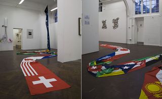 different flags spread along the floor
