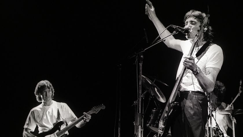 Eric Clapton (left) performs on stage as guest guitarist with Roger Waters (right) on Waters' 'Pros and Cons of Hitch Hiking' tour, Ahoy, Rotterdam, Netherlands, 19th June 1984