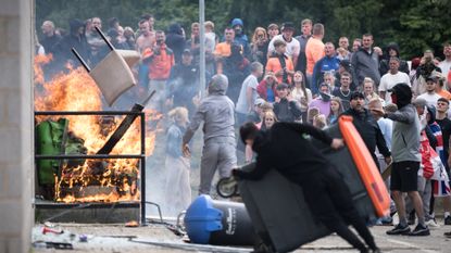 Far-right rioters attack Holiday Inn Express in Rotherham, England