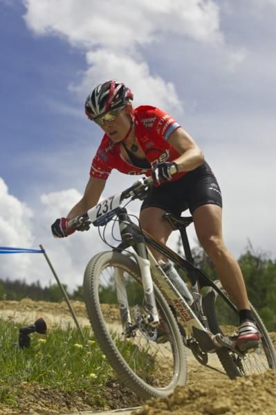 Katie Compton (Planet Bike,Stevens, Kenda) rails the downhill on her way to winning her second short track title