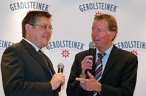 Team manager Hans-Michael Holczer with German sports TV anchorman Hans-Dieter Poschmann