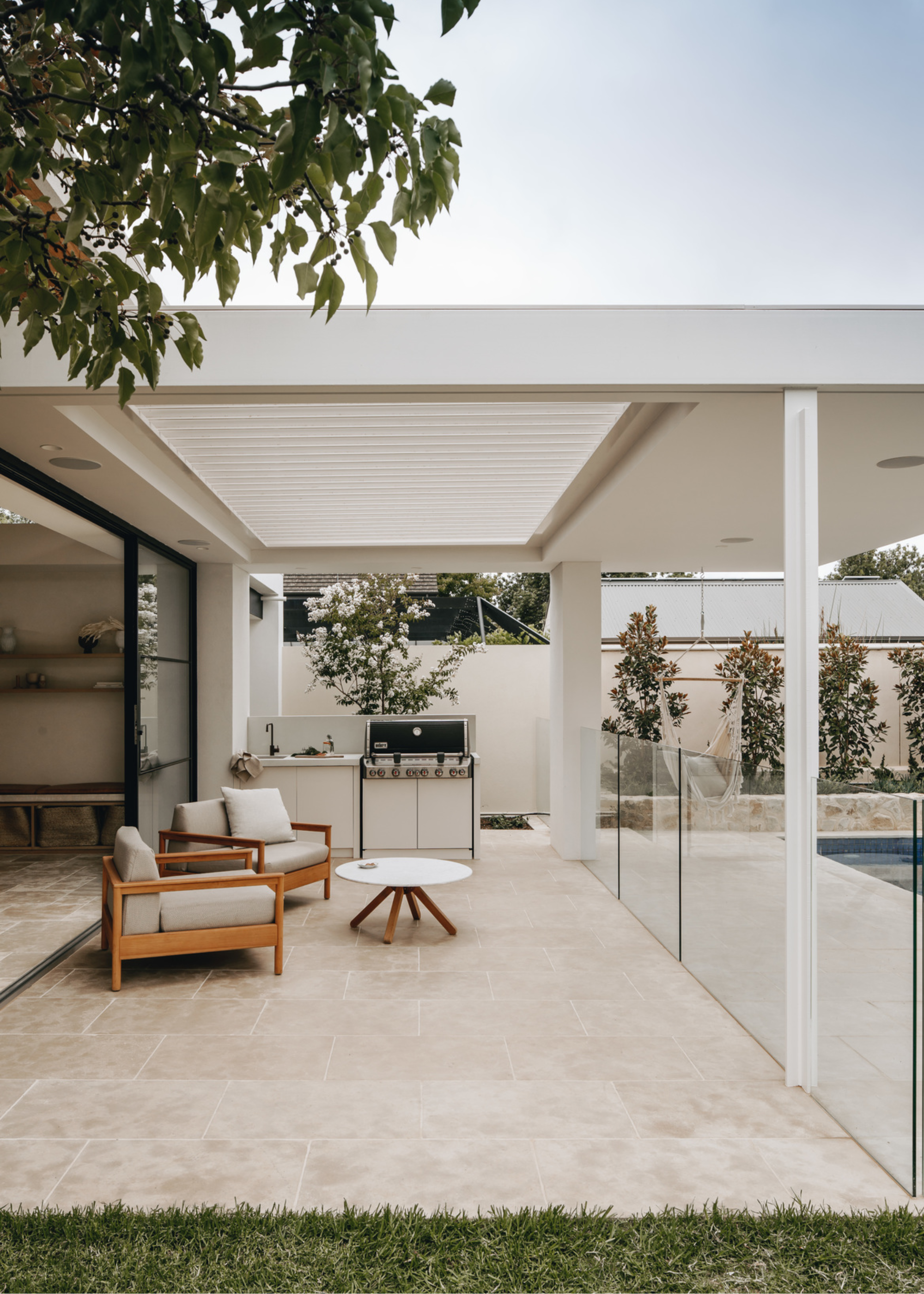 A backyard patio with outdoor seating area