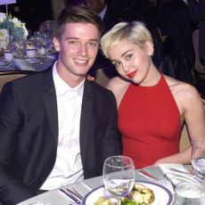 Patrick Schwarzenegger and Miley Cyrus attend the pre-GRAMMY Gala