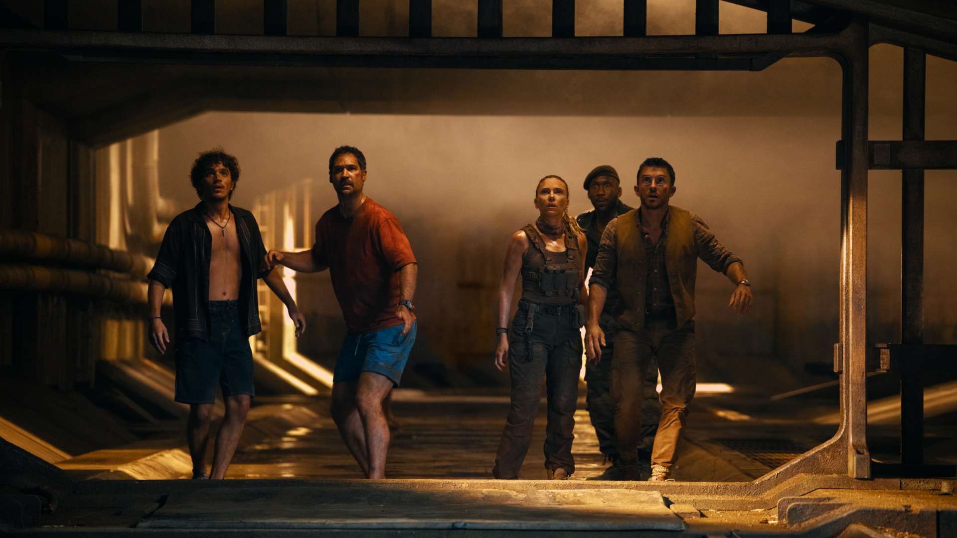 David Iacono, Manuel Garcia-Rulfo, Scarlett Johansson, Mahershala Ali, and Jonathan Bailey as Xavier, Rueben, Zora, Duncan, and Henry in Jurassic World Rebirth