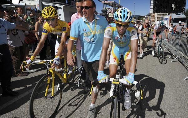Schleck and Contador cross the line together