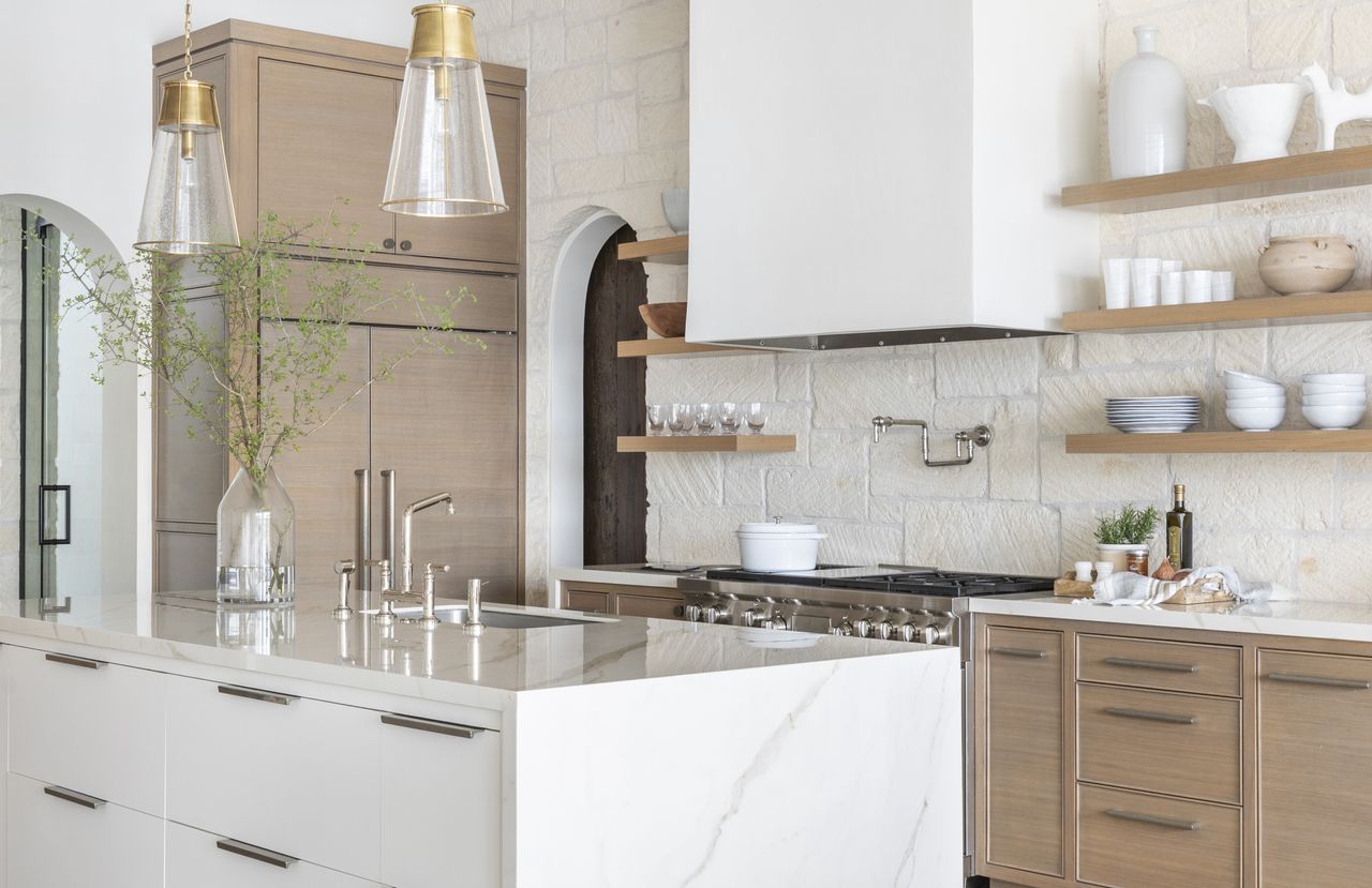 A kitchen with storage on the walls