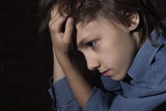 An image of a sad kid