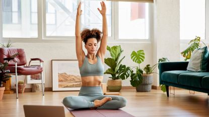 A woman trying a stretching workout