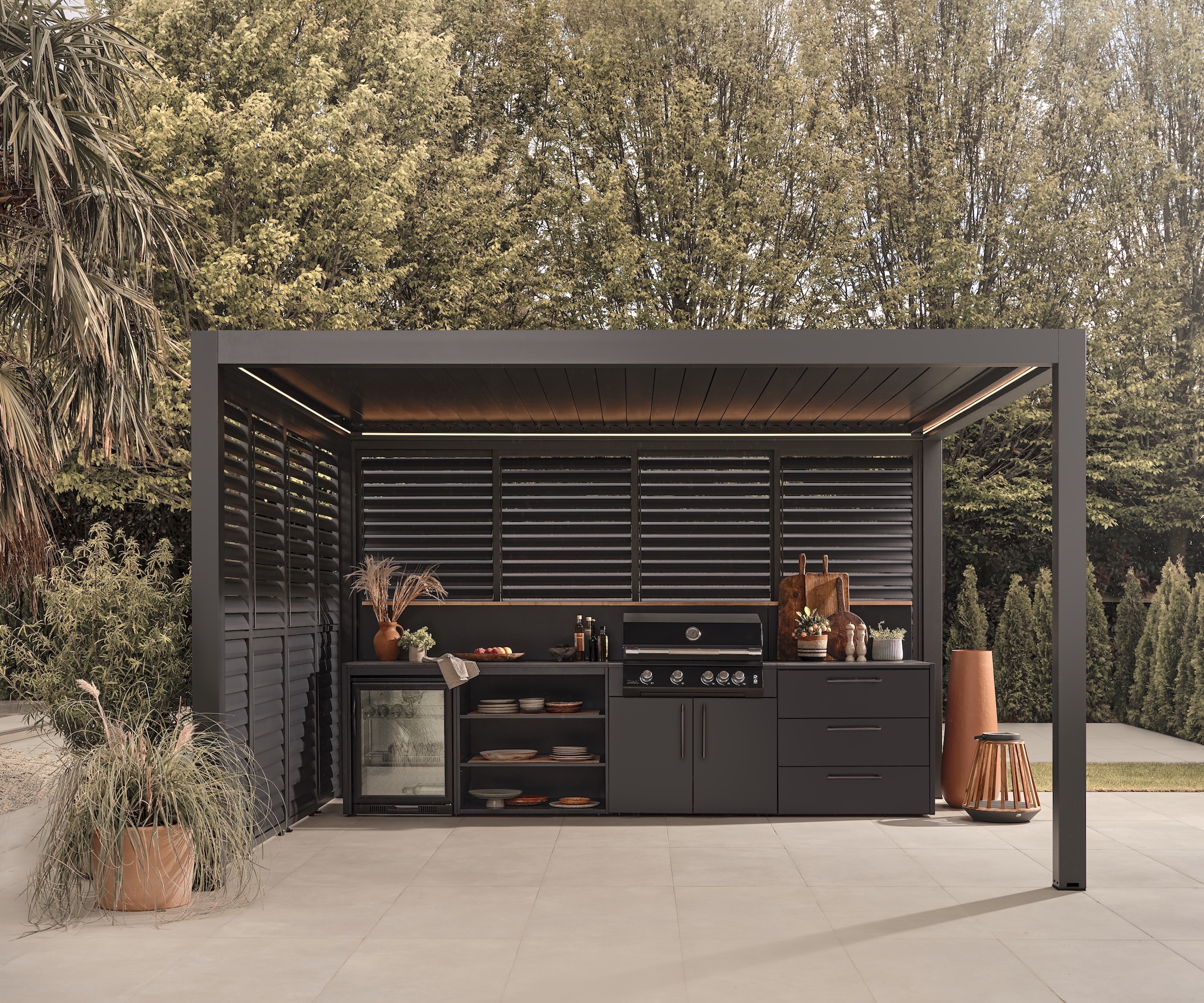 outdoor kitchen with louvred cover