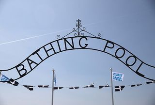 The sun shines above the Jubilee Pool lido in Penzance in Cornwall, England.