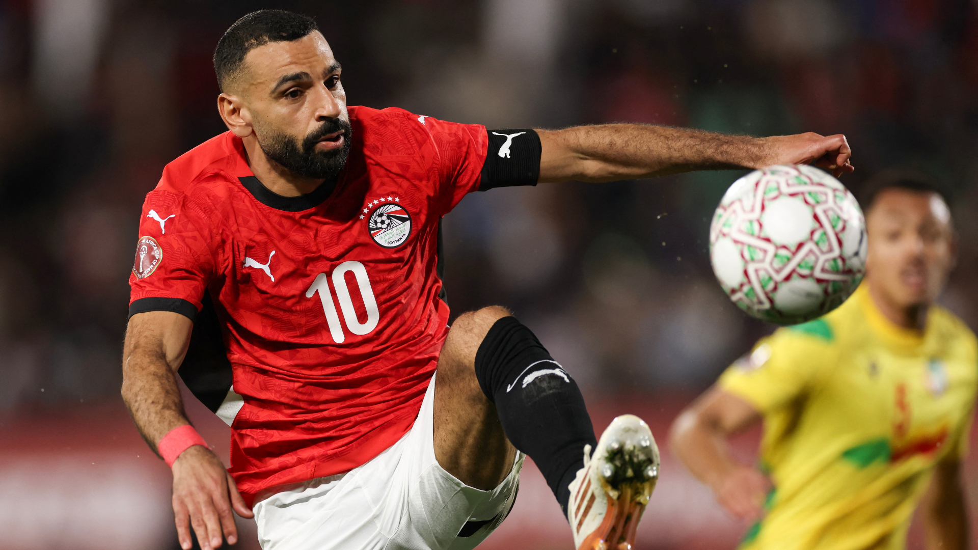 Egypt's forward #10 Mohamed Salah controls the ball during the Africa Cup of Nations (CAN) round of 16 football match between Egypt and Benin at the Grand Stadium in Agadir on January 5, 2026. 