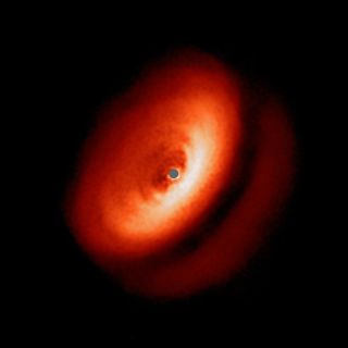 An image from the Very Large Telescope's SPHERE instrument showing the dusty disk around the young star IM Lupi.