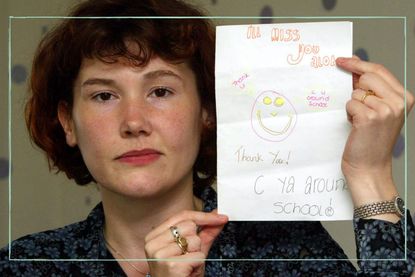 Maxine Carr holding a card made for her by Holly Wells