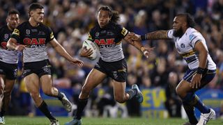 Jarome Luai of the Panthers is tackled during the NRL Qualifying Final match between the Penrith Panthers and the Parramatta Eels